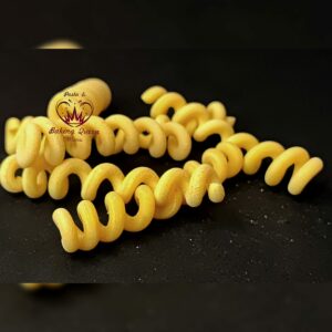 troquel hecho de colas de rizos de bronce / fusilli bucati