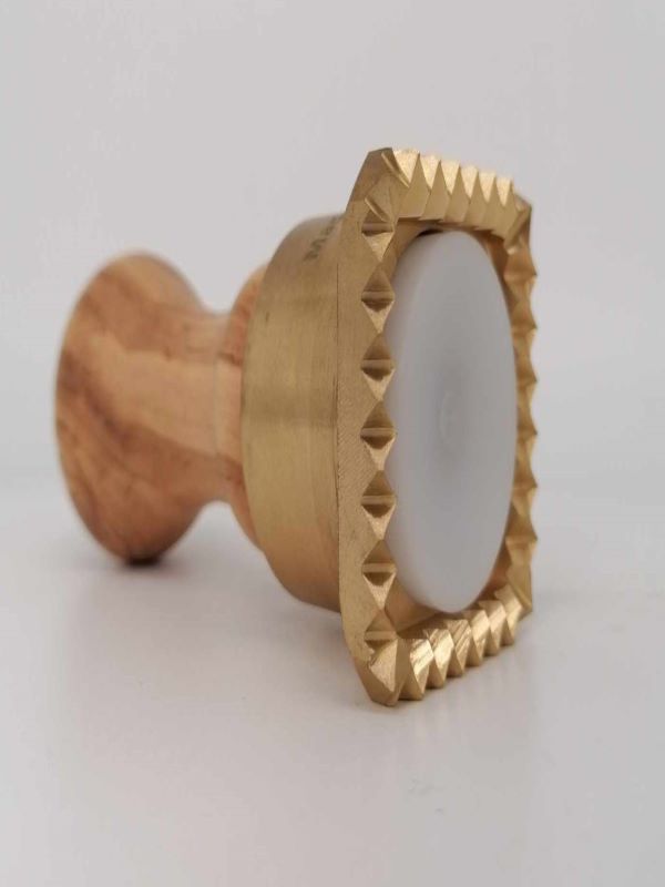 Round ravioli stamp made of brass with olive wood handle diameter 65 mm